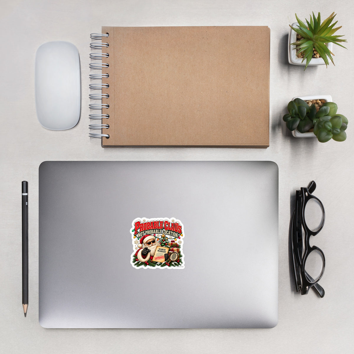 Probable Claus. Not Probable Location. — Christmas Sticker — front lifestyle (sticker on laptop)